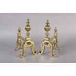 A PAIR OF VICTORIAN BRASS FIREDOGS, each having a reeded ball and baluster upright, on frilled and