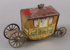 A W&R JACOB & CO LTD TIN PLATE BISCUIT TIN formed as a coach, the side panels containing classical