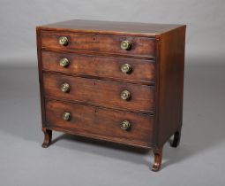 AN EARLY 19TH CENTURY MAHOGANY CHEST OF DRAWERS, the top cross banded with ebony stringing over four