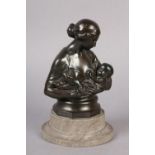 BRONZE BUST OF A MOTHER AND CHILD on stepped marble base, 20.5cm high