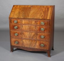 A GEORGE III FIGURED AND CROSSBANDED MAHOGANY BUREAU, having a fall front, the interior fitted