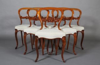 A SET OF SIX VICTORIAN-STYLE MAHOGANY BALLOON BACK DINING CHAIRS, with foliate carved tie rail and