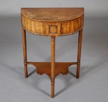 AN EARLY 19tTH CENTURY CROSSBANDED MAHOGANY DEMI-LUNE WASH STAND with boxwood stringing, having a