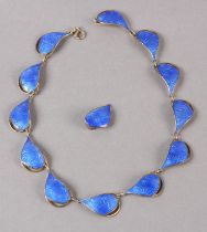 A NORWEGIAN GUILLOCHE SILVER GILT NECKLACE BY IVAR T HOLTH, the pierced drop shaped blue links