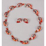 A NORWEGIAN GUILLOCHE SILVER GILT NECKLACE BY IVAR T HOLTH C1960, the open ribbon red links fastened