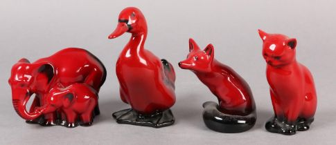 FOUR ROYAL DOULTON VEINED FLAMBE FIGURES OF AN ELEPHANT MOTHER AND CHILD GROUP, DUCK, FOX AND CAT,
