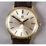 A TISSOT GENTLEMAN'S SEASTAR SEVEN AUTOMATIC DATE WRISTWATCH, c1975, in rolled gold case, jewelled
