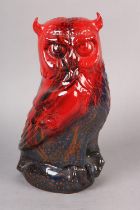 A ROYAL DOULTON VEINED FLAMBE FIGURE OF A GREAT HORNED OWL, modelled stood on a rock, marked to