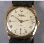 A ROTARY GENTLEMAN'S SUPER SPORTS MANUAL WRISTWATCH c1955 in 9ct gold cushion case no 682279, 15
