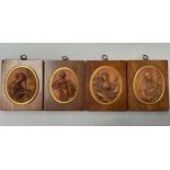 A SET OF FOUR EARLY 17TH CENTURY FLEMISH DEVOTIONAL BOXWOOD MEDALLIONS, oval, finely carved in