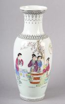 A CHINESE VASE, the ovoid body printed and enamelled with bijn in a garden landscape with motto,