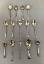 A collection of 19th and early 20th century silver spoons including a Victorian caddy spoon,
