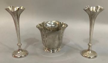 An Edward VII matched suite of silver table vase and pair of specimen vases by Wainwright Liverpool,