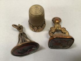 Two George III seal fobs both with paste intaglios (one at fault) together with early 19th century