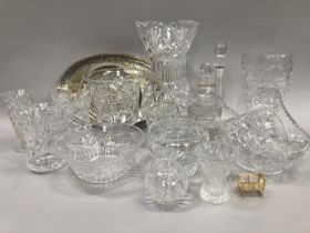 An etched sherry decanter and matching spirit decanter, EPNS galleried tray and another circular,