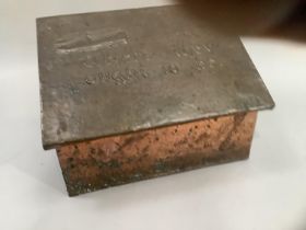 Copper Art Nouveau style slipper box, having a planished surface, the hinged lid bearing 'where they