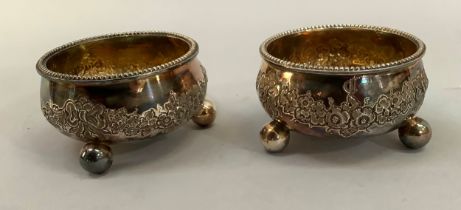 A pair of Victorian silver salts, Sheffield 1873 for Martin, Hall and Co of circular outline with