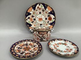 Royal Crown Derby plate pattern number 6041, two further plates and a twin handled sugar bowl with