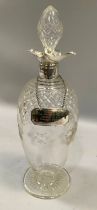 A silver collar and four lipped cut glass claret jug, Sheffield 1908, with EPNS presentation