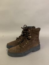 A pair of Tods brown suede army ankle boots, raised soles, front lacing, size 38, ribbed sides to