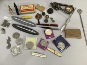 A lot containing several pens, two Royal commemorative pen knives, cigarette lighters etc