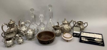 Three cut glass decanters together with silver plated tea and coffee set, moulded with flowers