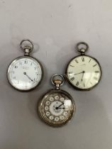 Three late 19th century fob watches all in open faced silver cases including a Waltham seaside grade