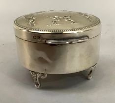 An Edward VII silver trinket box, Birmingham 1907 for William Hutton and Sons Ltd, of circular