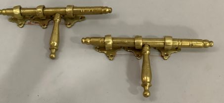 A pair of vintage brass door bolts each with three quatrefoil back plates, 26cm wide (bolt)