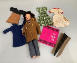 Sindy doll circa 1960's with various outfits and Sindy club magazine and stand