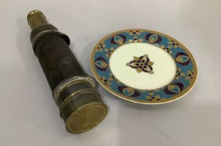 A 19th century six draw brass leather bound telescope with cap and a Noritake plate