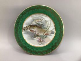 A Limoges Gout de Ville plate hand painted with perch on a riverbed within green and gilt border,