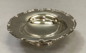 A silver pedestal dish, with cut border, Birmingham 1937, 15cm diameter, total approximate weight