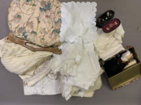 Edwardian cotton and lace combinations, with frills to the knee and panels of lace and broderie