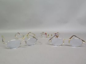 Four pairs of spectacles, some custom made by the client’s optician, Akkerman Rotterdam, Holland: an