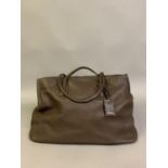 Jill Sander: a large and substantial chocolate brown soft leather shoulder bag with dark cotton