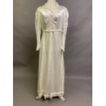 A 1930’s style full-length cream wedding dress, worn in the 1950's, in Yorkshire, the sweetheart