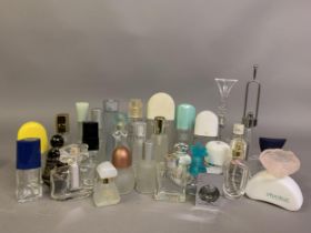 A large selection of perfume bottles from the 1980’s onwards, some boxed, to include Worth; Picasso;