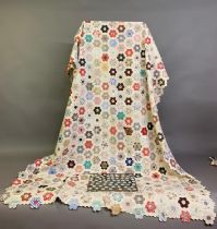 A good unfinished 19th century hand stitched quilt top, together with retained paper templates which