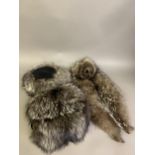 A silver fox fur ensemble, consisting of a hat with fur to the sides, the top black with