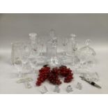 Quantity of cut glass including four decanters, a jug, a bowl and cover, wine glasses etc