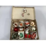 Fourteen vintage Christmas decorations in a box