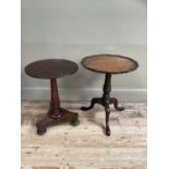 A Victorian mahogany circular wine table, turned central support, tripod base and on bun feet