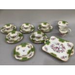 Grosvenor china tea service in green and pink comprising five cups, six saucers, six tea plates,