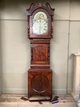 A Victorian mahogany longcase clock by T Whipp of Rochdale, with sun and moon dial, the face