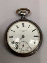 A George V pocket watch by John Dyson & Sons, Leeds, in an open faced gun metal case by Omega No