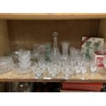 A large quantity of glass ware including cut glass trifle dishes, fruit bowls, two decanters, two