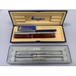 Waterman fountain pen in case, a Sceaffer fountain pen with 14k gold nib, Parker ballpoint pen in
