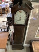 An early 19th century mahogany longcase clock having an arched enamel dial painted with flowers