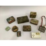 Collection of vintage advertising tins including for Hawino toffee, Skipper British Navy Cut,